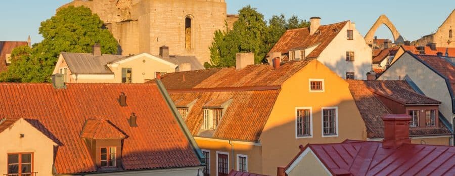 Rooftops and a medieval fortress in Visby, Sweden